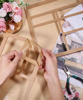 Hands working with Knockout Acrylic Valet Tray Router Templates With Three And Six Pockets for precise wood shaping.