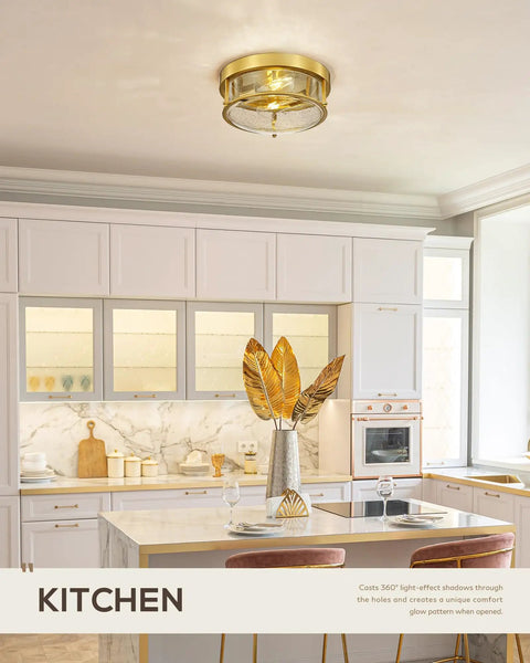 12 Inch Flush Mount Ceiling Light Fixture With Two Lights, Brass Gold Finish And Seeded Glass in a modern kitchen setting
