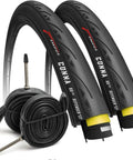 700x23c Road Bike Tire Set With Two Inner Tubes 60mm Presta Tubes Puncture Resistant Slick Tread Built For Folding Touring Gravel And Everyday City Commutes On 700c Bicycles, black tires and tubes shown