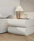 Level Up Your Bedroom Setup With This Modern Leather Upholstered Nightstand Boasting Roomy Desktop Space And Two Heavy Duty Wooden Drawers For Easy Storage, featuring smooth curves and compact design.
