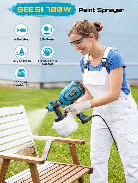 Woman using 700W HVLP Paint Gun With Four Swappable Nozzles And Three Spray Patterns on a wooden chair outdoors.