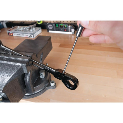 Using 8 Inch Long Pin Punch Set 5 Piece Carbon Steel With Knurled Handles For Deep Pin Removal In Obstructed Areas Includes 1/8 Inch 3/16 Inch 1/4 Inch 5/16 Inch And 3/8 Inch Pins Wall Mountable And Easy To Use on metal workpiece in vise