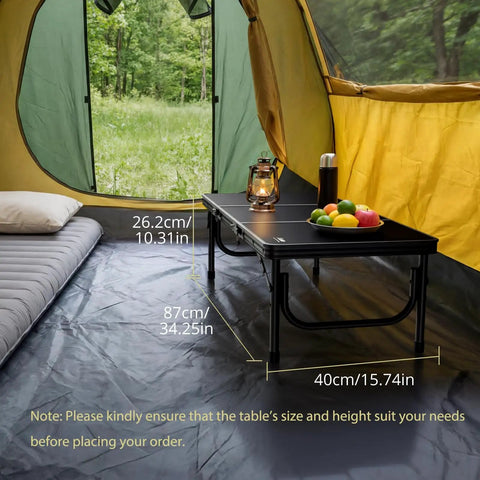 Three Foot Low Folding Picnic Table With Thick Aluminum Build, 10.3 Inch High inside a tent with camping gear and supplies.
