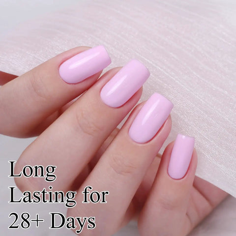 Close-up of nails painted with HEMA Free Gel Nail Polish Set With Milky Pink And Pastel Pink, Two 10ml Bottles, UV LED Soak Off Kit