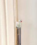 Whimsical Mini Swan Hinge Head Magnets Set Of 6 For Door Decor And Metal Surfaces installed on a door hinge pin.