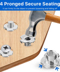 Close-up of 100 Pack One Quarter Twenty T Nuts Stainless Steel 304 Four Prong Tee Nuts installed in wood for secure joints