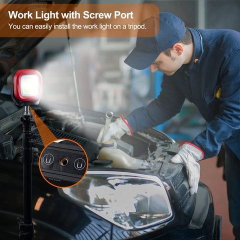Beast COB LED Work Light With 42 LEDs, 1000 Lumens, on a tripod illuminating a mechanic working on a car engine.