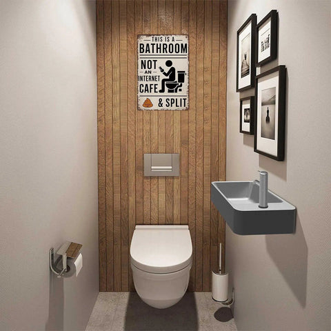 Kickass Vintage Metal Tin Sign 8X12 Inches With A Heck Funny Bathroom Wall Art And Farmhouse Humor Plaque mounted in a rustic bathroom.