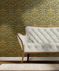 Premium Bluebird Damask Gold Metallic Wallpaper Eco Friendly Fibrous Texture behind a vintage white sofa.