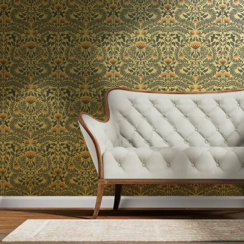 Premium Bluebird Damask Gold Metallic Wallpaper Eco Friendly Fibrous Texture behind a vintage white sofa.