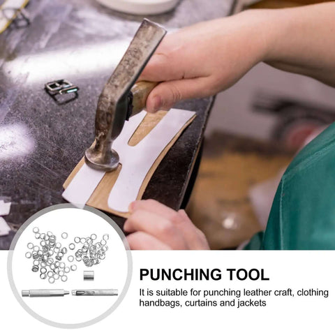 Person using 10mm Steel Eyelet Punch Tool And Base Kit With 100 Silver Eyelets for DIY leathercraft and clothing accessories installation.