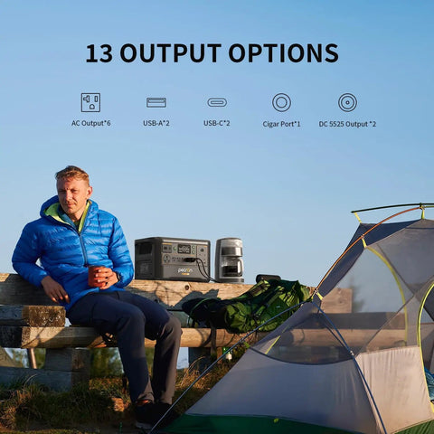Man relaxing with Beefy F3000LFP 3072Wh Portable Power Station With 3600W Pure Sine Wave LiFePO4 Battery Backup beside a tent