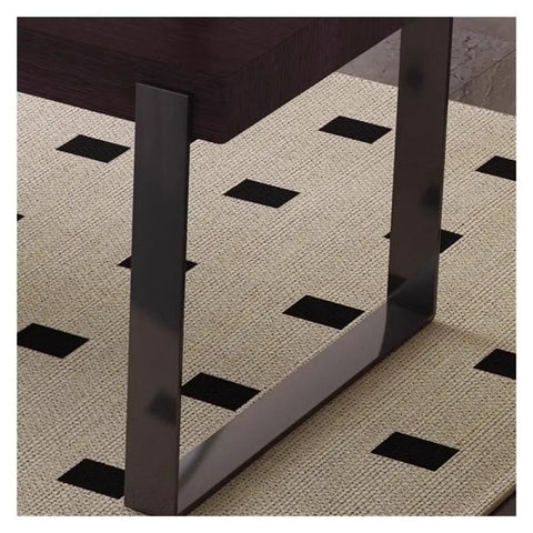 Close-up of Top Shelf Standing Desk With Sleek Smoky Matte Paint Boss Ready Computer Workstation stainless legs on a patterned rug.