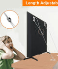 Adjustable 42 Inch TV Safety Straps No Drill Anti Tip Furniture Anchors Kit For Baby Proofing attached to a flat screen and desk