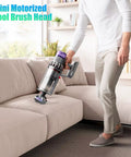 Person using Mini Motorized Turbo Brush Head Anti-Tangle Pet Hair Attachment for Cordless Vacuums on a couch