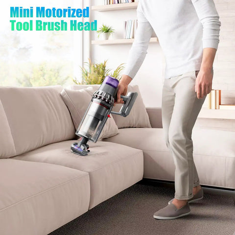 Person using Mini Motorized Turbo Brush Head Anti-Tangle Pet Hair Attachment for Cordless Vacuums on a couch