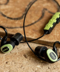 Green and black all day noise blocking earbuds with Bluetooth 5.0 27 dB NRR 79 dB volume limit OSHA compliant hearing protection.
