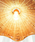 YUJIDAO 19.7 Inch Rattan Chandelier, Boho Pendant Lighting, close-up view of hand-woven shade and light bulb.