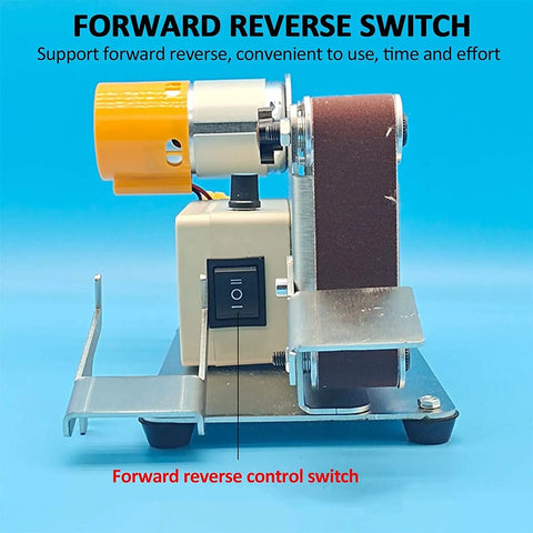 Close-up of Compact Mini Belt Sander With Polishing Wheel and Automatic Tensioning for Desktop Use showing forward reverse switch.