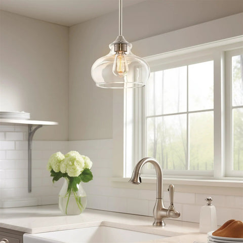 Modern Schoolhouse Pendant Light With Clear Glass Shade In Brushed Nickel Finish in kitchen over sink