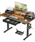 Chill 47 Inch Electric Standing Desk With Glowing RGB LED Gaming Table Features Memory Height Settings For Customizable Home Office Or Battle Station Setup with drawer and accessories.