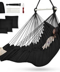 Hammock Chair With Foot Rest And Cushions, Durable Metal Spreader Bar Swing Chair for Indoor Outdoor Chill and Relaxation, Ideal for Bedroom Patio Porch or Tree, Supports Up To 500 Lbs, Black, showing complete set with included accessories.