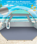 Family Beach Tent Sun Shelter With UPF 50 Plus UV Protection on sandy beach with ocean view