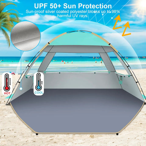 Family Beach Tent Sun Shelter With UPF 50 Plus UV Protection on sandy beach with ocean view