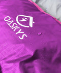 Close-up of waterproof purple All Season Camping Sleeping Bag for Adults and Kids, Lightweight and Warm in 10 to 20 Degrees Celsius.