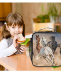 Desert Horses Insulated Lunch Box For Kids Girls And Boys with horse design, next to smiling child eating sandwich.