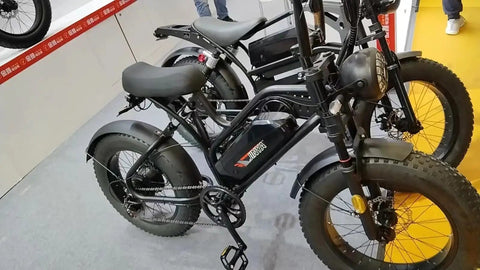 Beefy 20 Inch Fat Tire Front Fork with Air Suspension for E Bike and MTB, double shoulder, on display alongside e-bikes