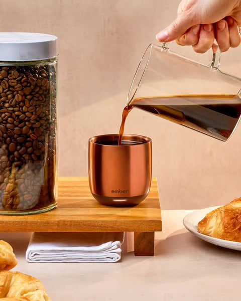 Renewed 6 Oz Smart Heated Coffee Mug With App Precision Temp Control And Solid Battery Life Keeps Your Favorite Brew Piping Hot And Ready For All Day Sipping Sessions, filled with coffee.