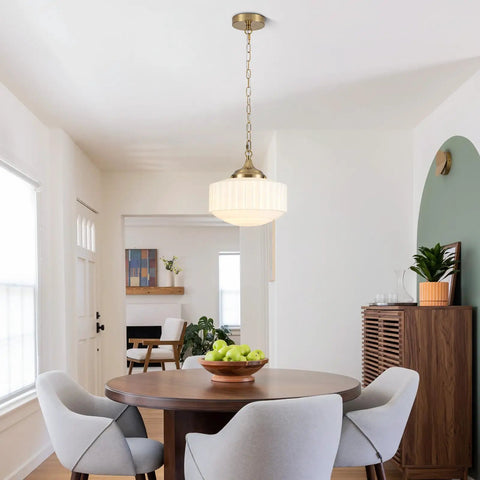 Lumraxsun Vintage Pendant Light Over Kitchen Glass Kitchen Pendant Light hanging over a round dining table with gray chairs.
