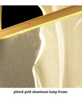 Close-up of the plated gold aluminum lamp frame from the Sleek Modern Acrylic Led Chandelier Drops Fresh Warm Glow For Living And Dining Rooms With Hand Polished Metal Accents Delivering A Killer Minimalist Indoor Pendant Vibe For Home Decor.