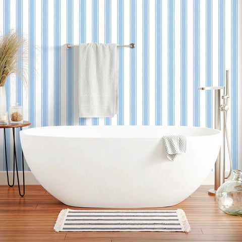 Easy Peasy Peel And Stick Self Adhesive Wallpaper With Chill Blue And White Hand Drawn Stripes in a bathroom setting.