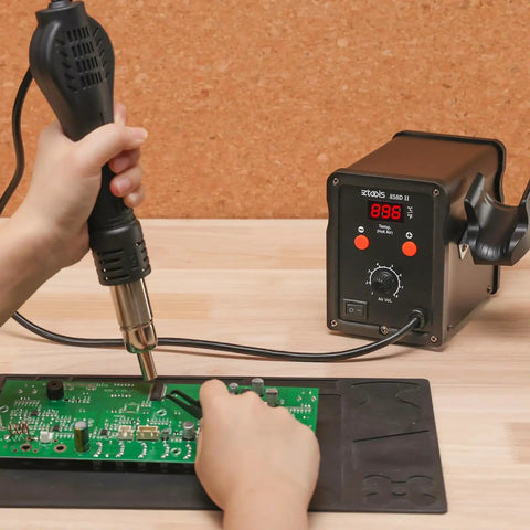 Pro Grade Hot Air Rework Station Kit With Three Nozzles 5mm 8mm 10mm, PID Temperature Control From 212F To 896F in use on PCB