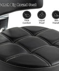 Close-up of the seat on Lockable Boss Ergonomic Rolling Stool With Backrest And Foot Rest, highlighting thick comfort cushion.