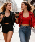 Two women walking with Heavy Duty 16 Oz Disposable Coffee Cups With Lids Sleeves And Straws 100 Pack Thickened Leak Proof Insulated Paper Cups