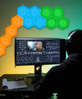 Hexagon LED Wall Panels 6 Pack With Remote And Touch Control, 13 Color RGB Modular DIY Wall Lights in game room setup