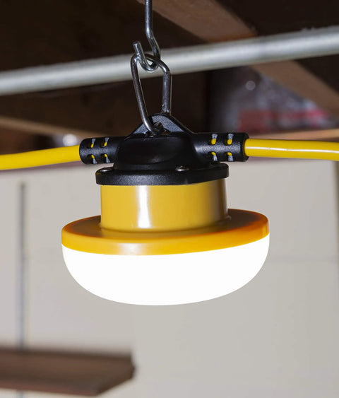 Close-up of 100 Ft LED Light Stringer With Integrated 13 Watt LEDs 1,600 Lumens Per Light 16,000 Total Lumens 18 Gauge Two Wire Cord