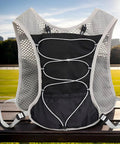 Hydration Running Vest With 5L Capacity, Reflective Water Backpack with mesh design on park bench