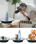 Qinmay 360 Degree Rotating Display Stand With Remote Control and Five PVC Backgrounds for ECommerce Product Photography Shoots, showcasing camera setup.