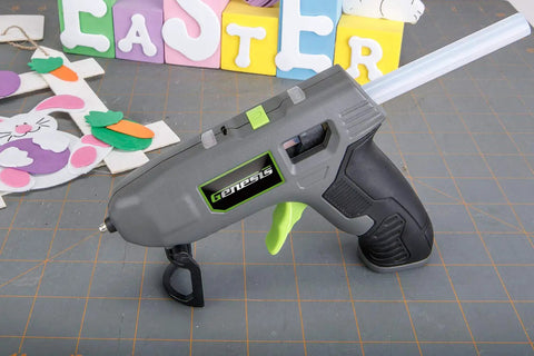 Genesis Cordless Hot Glue Gun With Quick 25 Second Preheat USB Charge on crafting table with Easter decorations