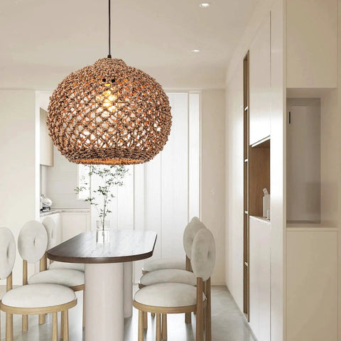 Seagrass Boho Chic Vibe Chandelier Hanging Lamp Natural Rattan Weaving Single Light Fixture in modern dining room setting.