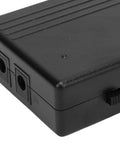 Solid 7800mAh UPS Power Supply For Router And Modem Backups Delivers Steady 24 Watts, black protective casing with input and output ports.