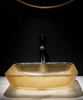 USZWBY Yellow Square Shape Tempered Glass Bathroom Vessel Sink with Waterfall Tap Modern Artistic Vessel Sink with Pop Up Drain, Counter Top Installation on a white countertop