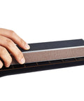 Person using 10 Inch Professional Guitar Fret Leveling Beam And Heavy Grit Sanding File Block on guitar fretboard for smoothing edges.