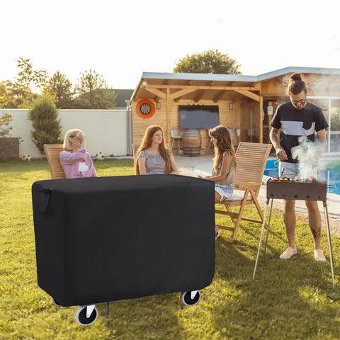 Waterproof Rolling Tool Cart Cover 36x18x33 Inch For 32x18 Mobile Utility Carts in a backyard setting with people relaxing.