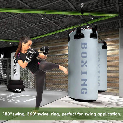 Heavy Duty 360 Degree Swivel Hanger Built Tough As Nails From Rustproof Stainless Steel Ceiling Bracket supporting punching bags in gym.