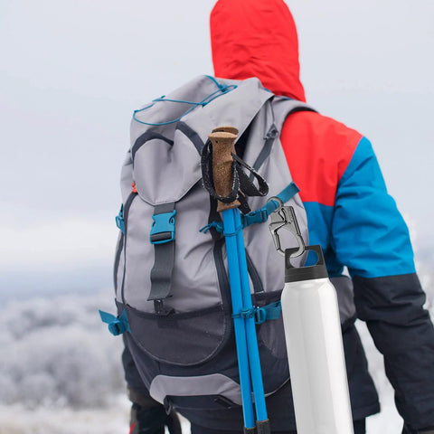 Hiker wearing a backpack with a Double Lock Carabiner Clip With Anti Misopening Design 3.1 Inch Zinc Alloy Heavy Duty Keychain